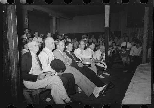 Spectators at wrestling match, Sikeston, Missouri