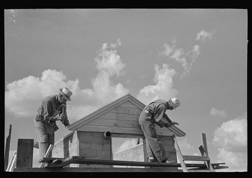 Food storage. Erecting shop assembled gable ends. Southeast Missouri Farms Project