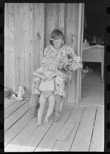 Untitled photo, possibly related to: Grandmother and child, Southeast Missouri Farms