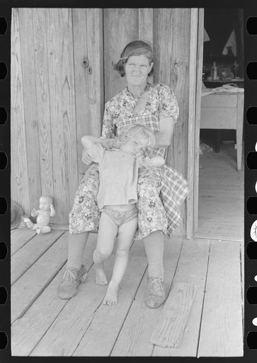 Untitled photo, possibly related to: Grandmother and child, Southeast Missouri Farms