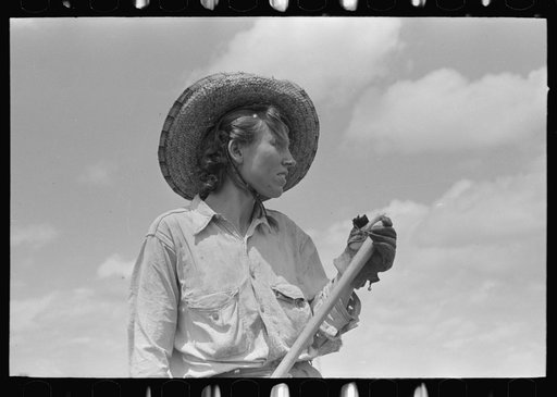 Sharecropper's wife with hoe, New Madrid County, Missouri