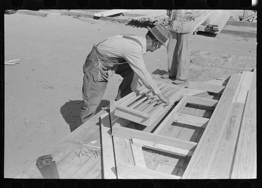 Setting louver in gable and frame, house plant, Southeast Missouri Farms Project yard