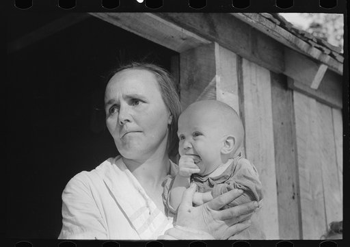 Wife and child of sharecropper, cut-over farmer in bottoms of Mississippi River