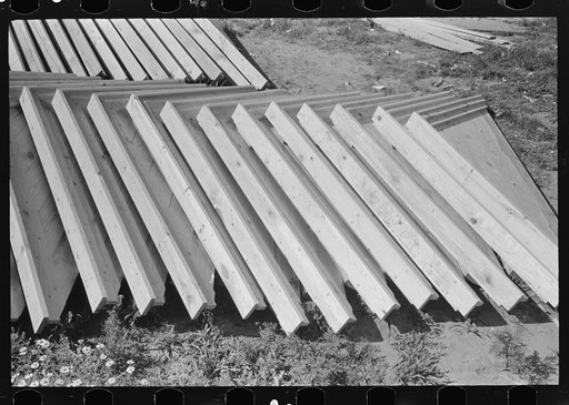 Food storage plant. Stack of feed storage gable ends. Southeast Missouri Farms Project