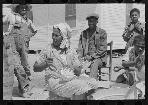 Southeast Missouri Farms. Family of FSA (Farm Security Administration) client shredding cabbage, to be used for making sauerkraut