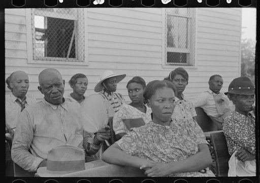 Untitled photo, possibly related to: Wives of FSA (Farm Security Administration) Negro clients listening to speech by visiting public health official, Southeast Missouri Farms. La Forge, Missouri