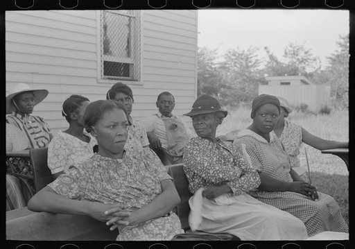 Untitled photo, possibly related to: Wives of FSA (Farm Security Administration) Negro clients listening to speech by visiting public health official, Southeast Missouri Farms. La Forge, Missouri