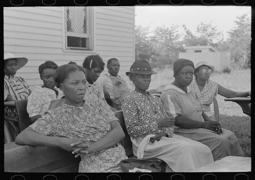 Wives of FSA (Farm Security Administration) Negro clients listening to speech by visiting public health official, Southeast Missouri Farms. La Forge, Missouri