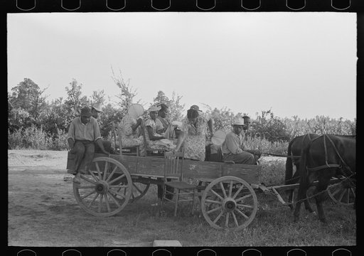 Negro clients arriving in wagon at meeting, Southeast Missouri Farms.