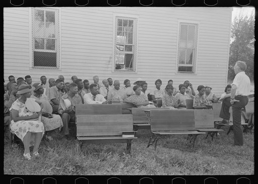 Negro clients listening to talk by project manager, Southeast Missouri Farms