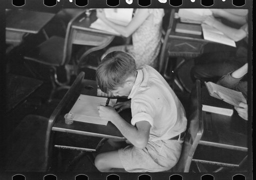 Untitled photo, possibly related to: Child studying in school, Southeast Missouri Farms