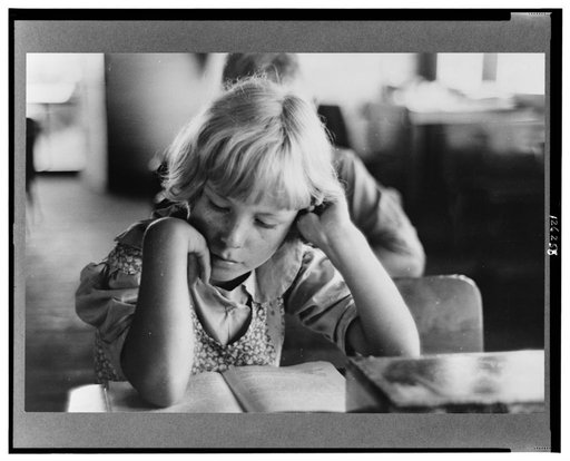 Child studying in school, Southeast Missouri Farms