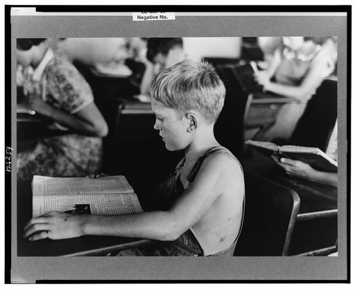 Child studying in school, Southeast Missouri Farms