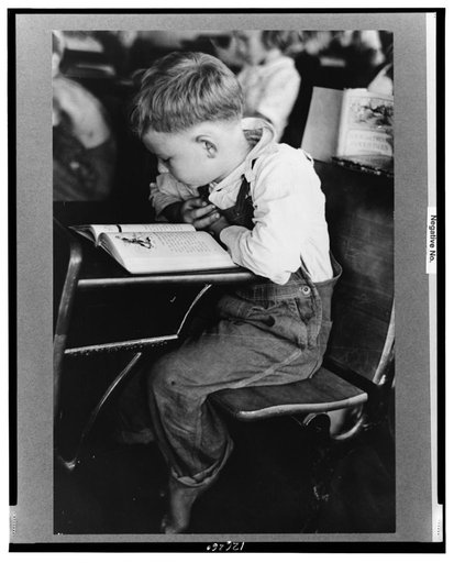 Child studying in school, Southeast Missouri Farms