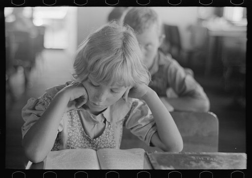 Untitled photo, possibly related to: Child studying in school, Southeast Missouri Farms