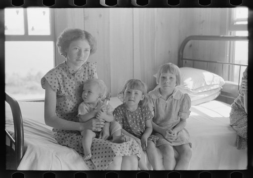 Untitled photo, possibly related to: Child of people living on river side of levee, Caruthersville, Missouri