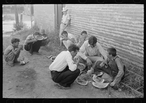 Untitled photo, possibly related to: Natives eating watermelons, Steele, Missouri