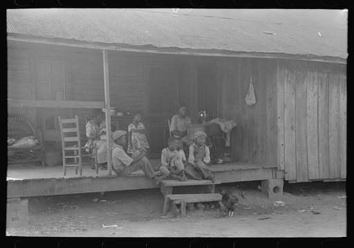 Untitled photo, possibly related to: Background photo, family of Negro FSA (Farm Security Administration) client, who will participate in tenant purchase program. Caruthersville, Missouri