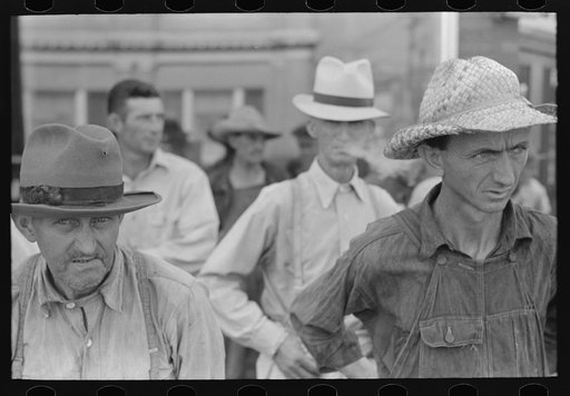 Untitled photo, possibly related to: Farmers standing in street, Caruthersville, Missouri