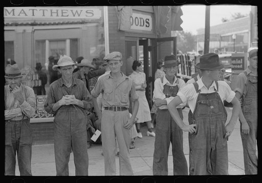 Farmers standing in street, Caruthersville, Missouri