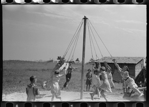 Children swinging on maypole, La Forge, Missouri. Project school at Southeast Missouri Farms