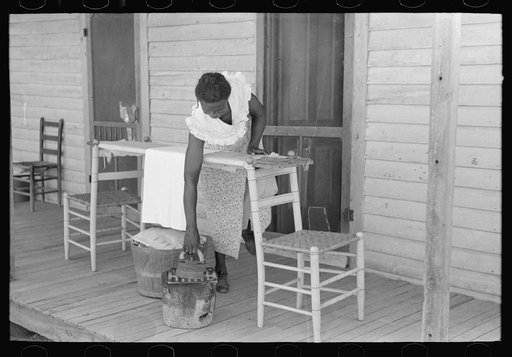 Housewife ironing, Caruthersville, Missouri