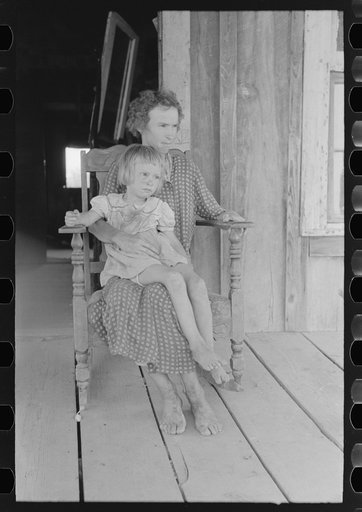Untitled photo, possibly related to: Mother and child, squatters near Caruthersville, Missouri