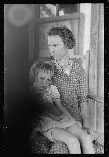 Untitled photo, possibly related to: Mother and child, squatters near Caruthersville, Missouri