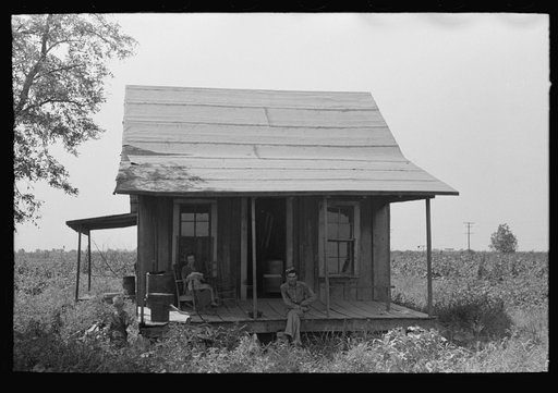 Untitled photo, possibly related to: Detail of sharecroppers' cabin now occupied by squatter near Caruthersville, Missouri