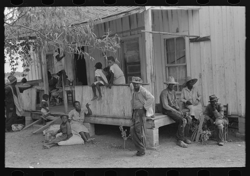 Group of Negro cotton pickers resting during lunch hour, Lehi, Arkansas