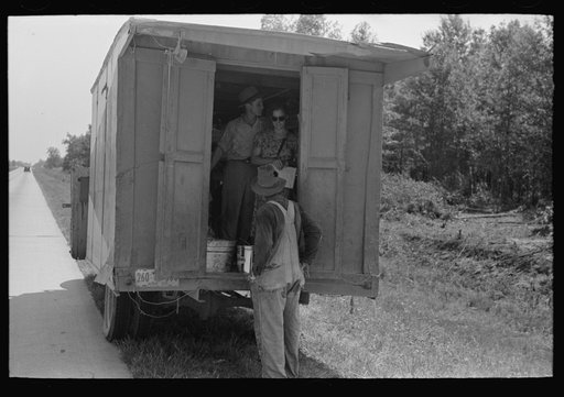 Untitled photo, possibly related to: Making purchase at traveling grocery store, Forrest City, Arkansas
