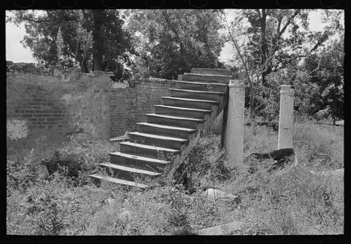 Stairs and columns with brick masonry, remains of plantation house after fire, near Lutcher, Louisiana
