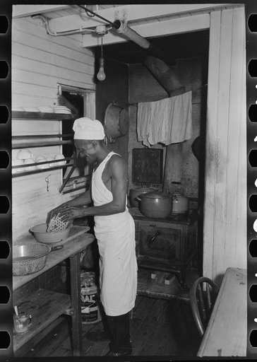 Untitled photo, possibly related to: Cook of El Rito in galley of packet boat on lower Mississippi River