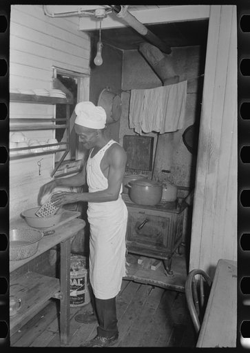 Cook of El Rito in galley of packet boat on lower Mississippi River