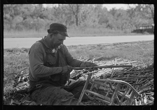 Untitled photo, possibly related to: Migrant worker making cane chairs, near Paradis, Louisiana