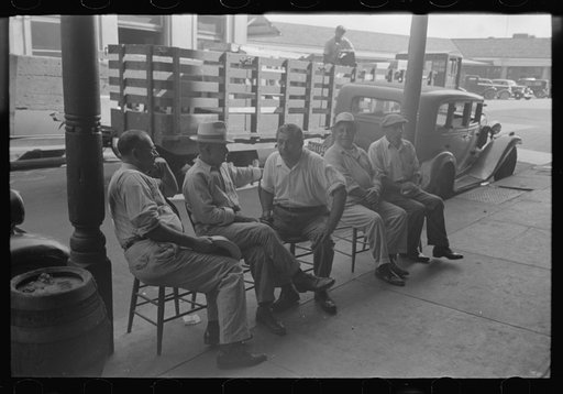 Untitled photo, possibly related to: Group of Italians talking, Decatur Street, New Orleans, Louisiana