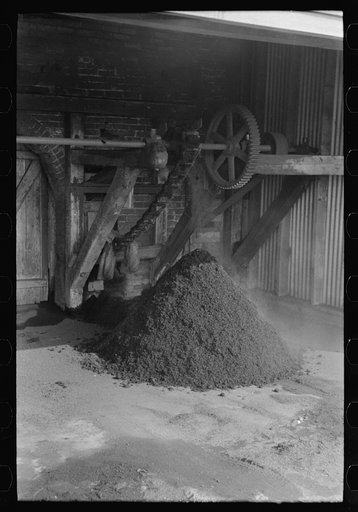 Untitled photo, possibly related to: Refuse from rice mill constitutes a very small percentage of total. Most of the byproducts have found a use and consumption. State mill, Abbeville, Louisiana