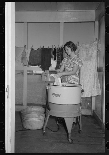 Farm wife washing clothes, Lake Dick Project, Arkansas