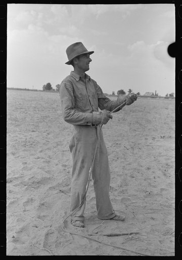 Untitled photo, possibly related to: Elevating hay into loft, Lake Dick Project, Arkansas