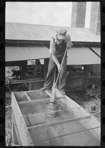 Untitled photo, possibly related to: Cleaning vats used in production of syrup from sorghum, Lake Dick Project, Arkansas