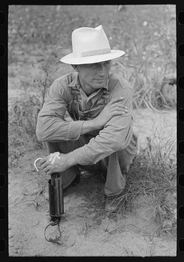 Member of cooperative association, with cotton scale, Lake Dick Project, Arkansas