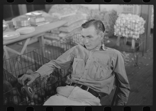 Farmer in store, Lake Dick Project, Arkansas