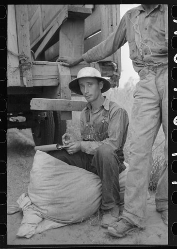 Recording weights of cotton picked by day laborers, Lake Dick Project, Arkansas