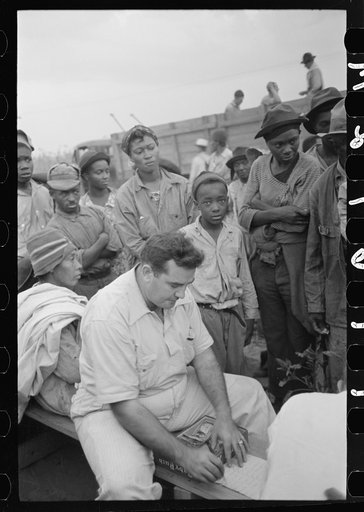 Cotton pickers waiting to be paid off at Lake Dick Project, Arkansas