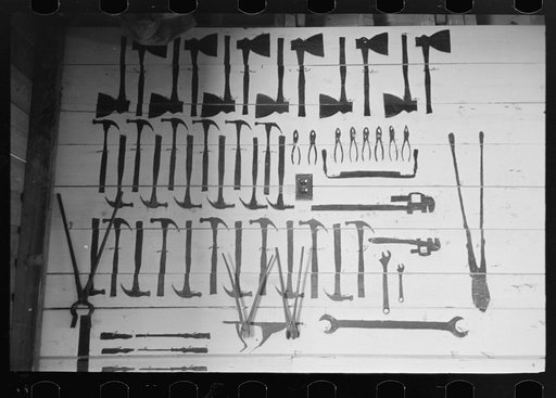 Patterns of tools painted on wall for easy identification, Lake Dick Project, Arkansas