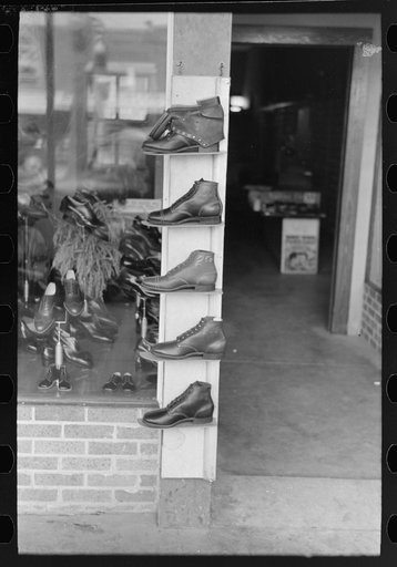 Display of shoes in front of store, Crowley, Louisiana