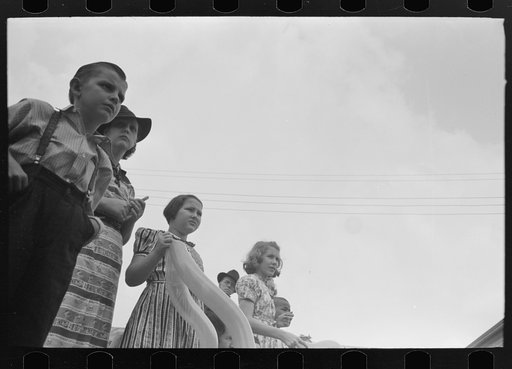 Untitled photo, possibly related to: People waiting on sidewalk for parade, National Rice Festival, Crowley, Louisiana