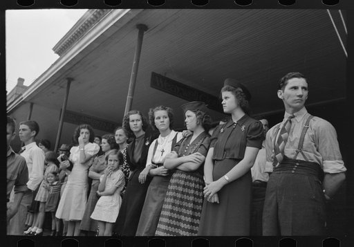 Untitled photo, possibly related to: People waiting on sidewalk for parade, National Rice Festival, Crowley, Louisiana
