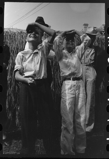 Untitled photo, possibly related to: Arranging prizes to be awarded at game concession, National Rice Festival, Crowley, Louisiana