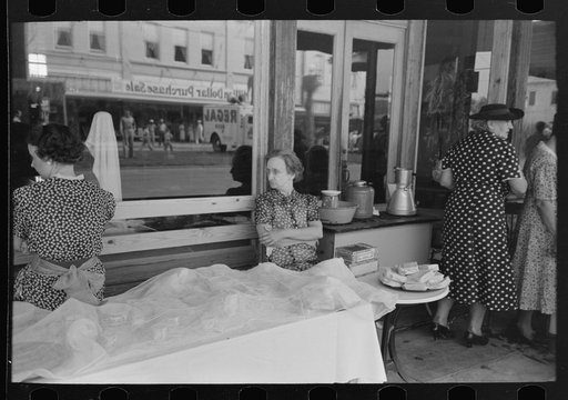 Untitled photo, possibly related to: People waiting on sidewalk for parade, National Rice Festival, Crowley, Louisiana
